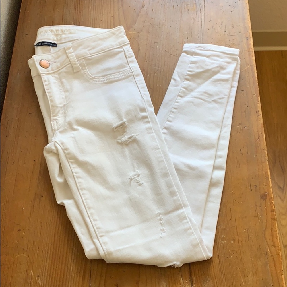 Skinny why distressed jeans